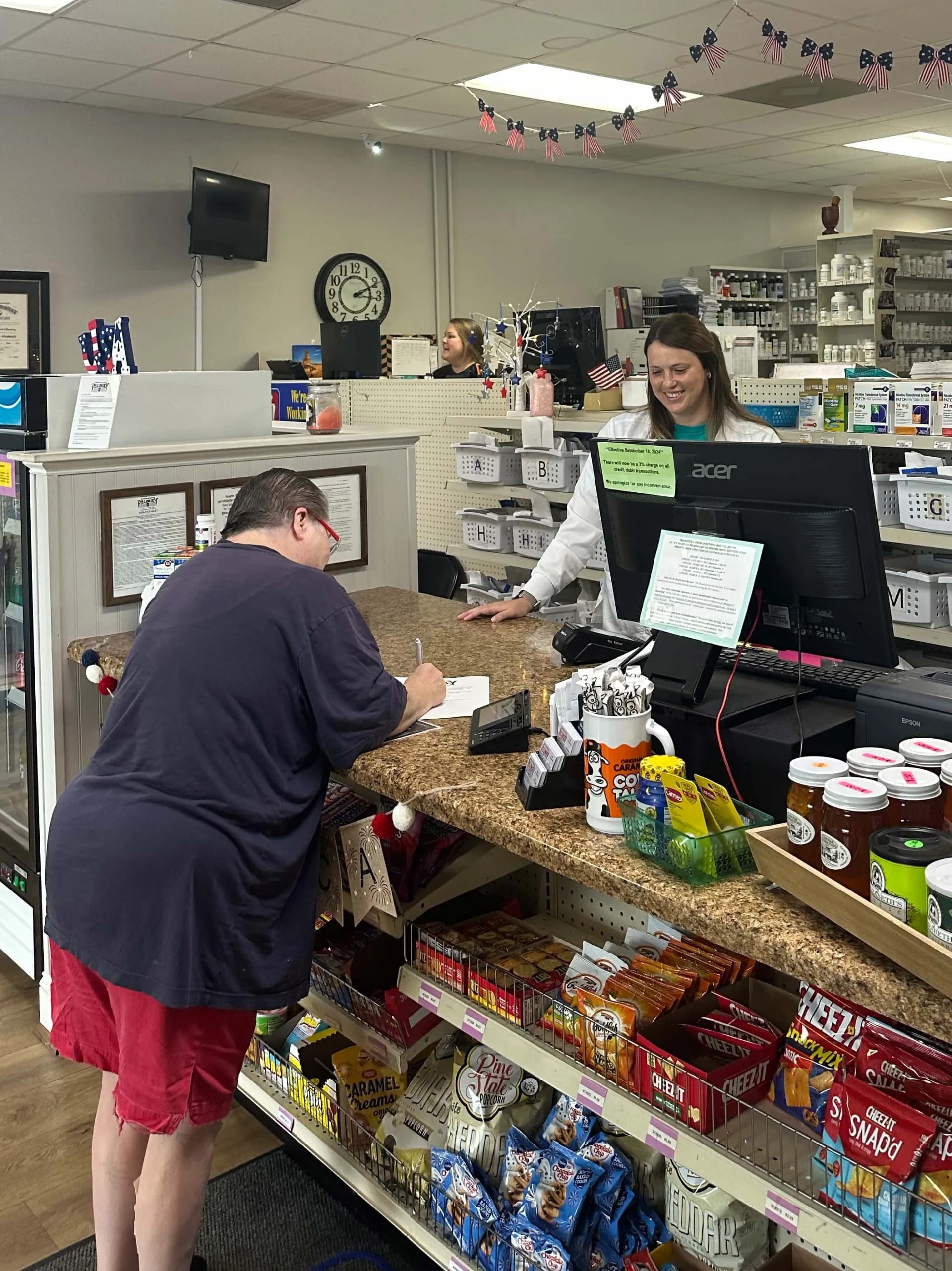happy patient visiting Rosewood Pharmacy
